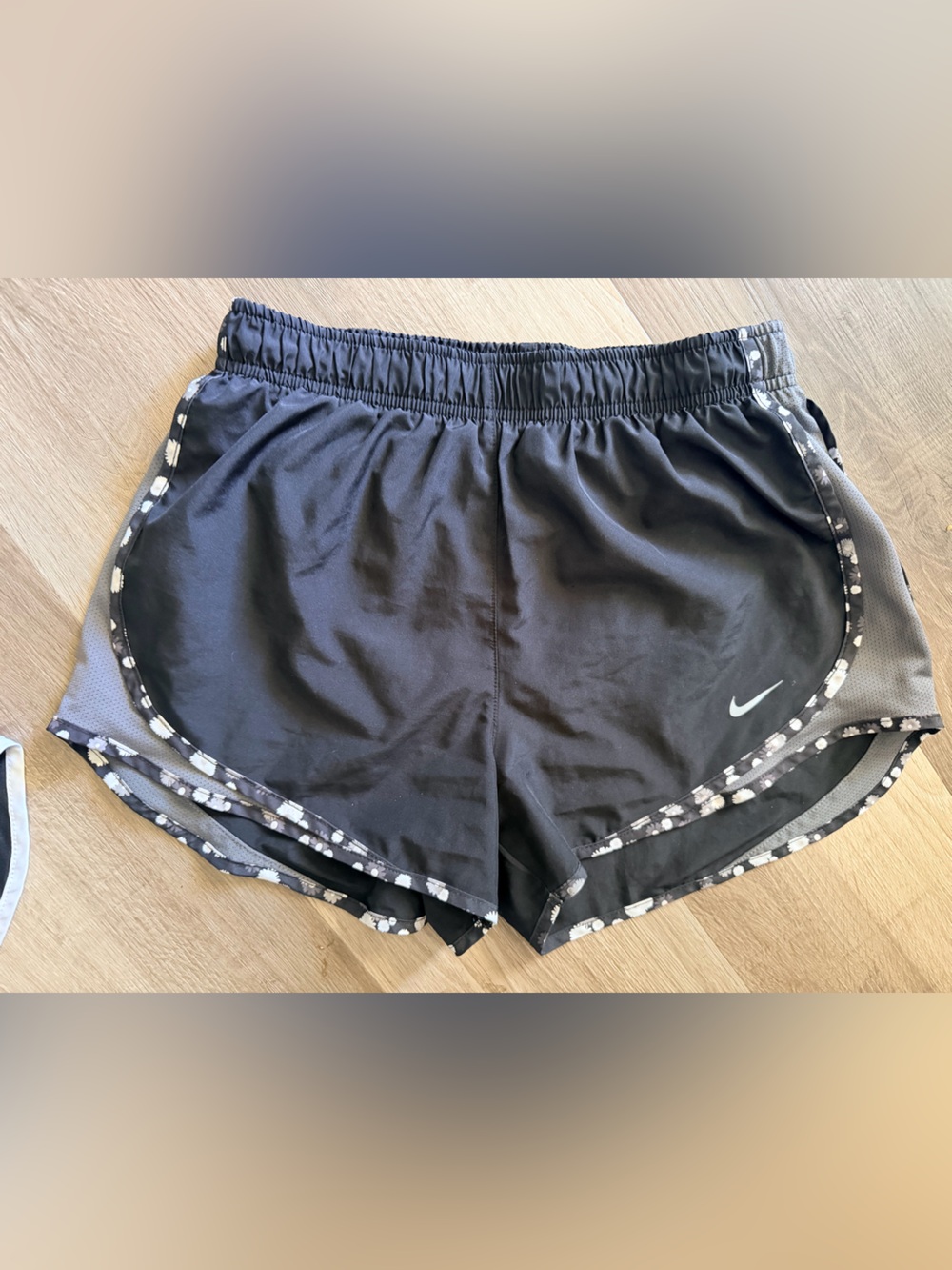 Nike Women’s Black Athletic Shorts with Gray Floral Trim